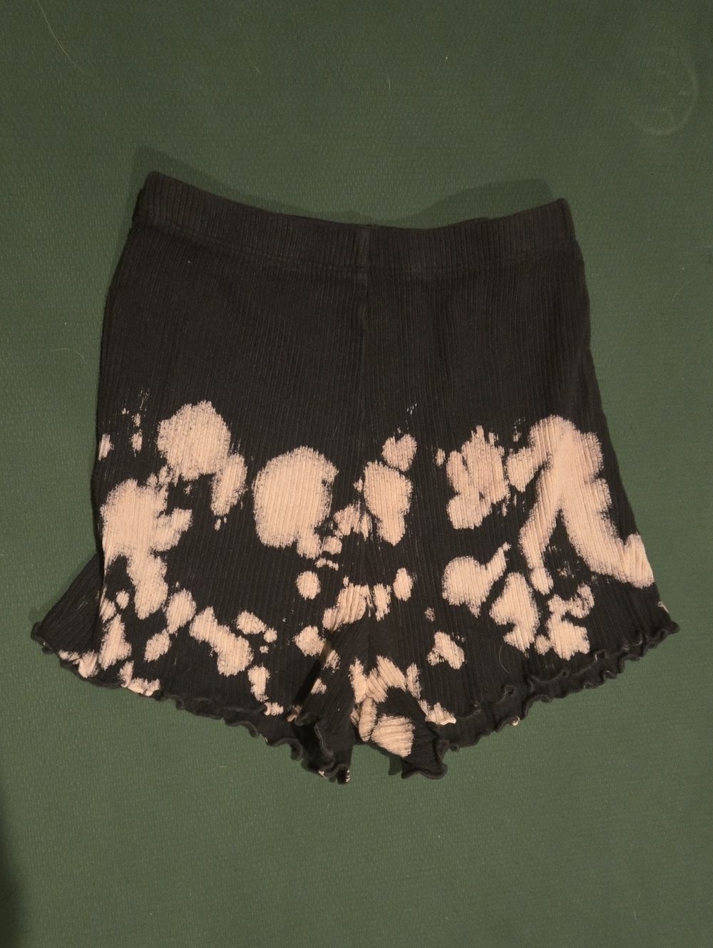 Dolls Kill Black Ribbed Tie-Dye Bike Shorts with Light Pink Bleach Splotches